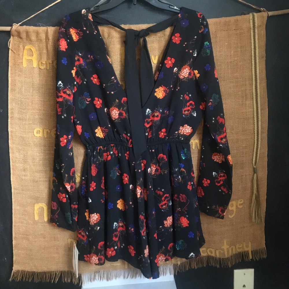 Floral and black, long sleeve GB romper.